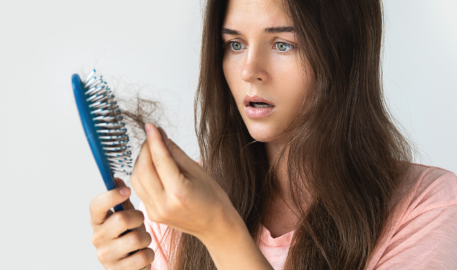 Woman lost hair in hair brush